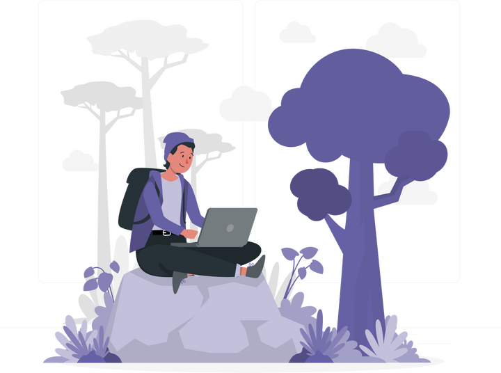 Homme dans la nature sur son ordinateur portable